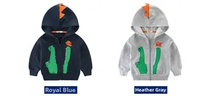 Dettagli felpe con cappuccio dinosauro blu e grigio con stampe di coccodrilli e pinne 3D