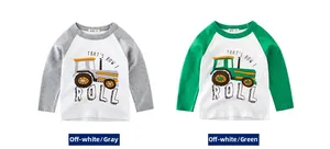 Detail of boys' cotton long-sleeve T-shirts with raglan sleeves and tractor prints