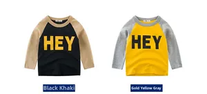 Detail of kids long sleeve raglan t-shirts with HEY lettering and contrast sleeves