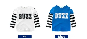 Detail of kids long sleeve t-shirts in off-white and blue with striped sleeves and BUZZ print