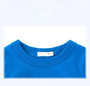 Close-up of royal blue round neck cotton T-shirt showing collar texture and size 90 label