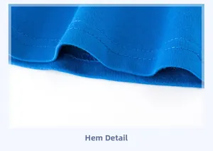 Close-up of blue cotton T-shirt hemline with durable double-needle stitching detail