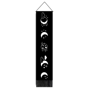 Minimalist moon phase black wall tapestry with tassels and hanging wooden bar