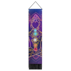 Macro view of chakra meditation tapestry featuring luminous energy points and tassels