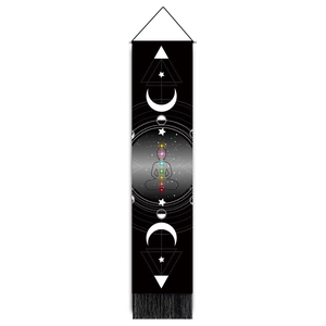 Detailed macro view of the meditation chakra tapestry featuring moon phases and black tassels