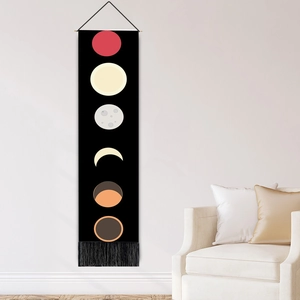 Modern moon phase wall tapestry with black base and tassel fringe for home decor