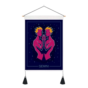 Detail of Gemini zodiac tapestry with wooden hanger, navy blue starry sky and tassels