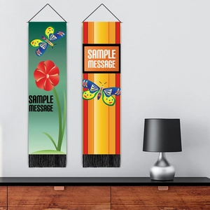Hanging wall tapestry featuring colorful butterfly and flower designs with black tassels