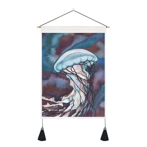 Detail of Nordic cotton linen tapestry with watercolor jellyfish print and black tassels