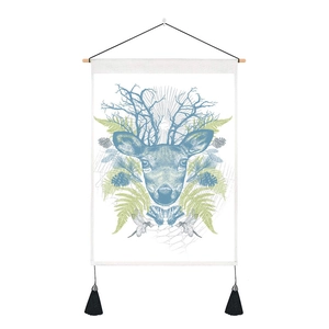 Detail of cotton linen tapestry featuring a deer head and artistic tassels for wall decor