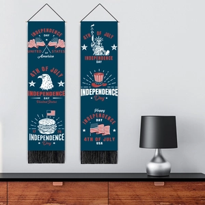 Independence Day hanging banners with American flags and eagles on a grey living room wall