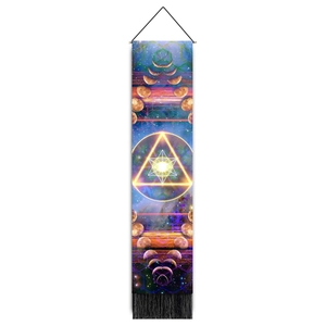 Detail view of moon phase tapestry with geometric stars and black silk tassels