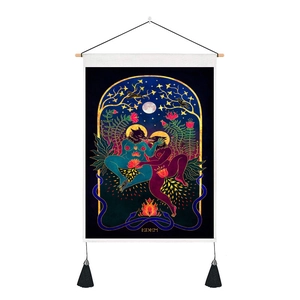 Macro shot of Eden tarot tapestry featuring mystic wolf figures and black decorative tassels