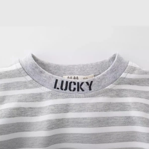 Toddler grey and white striped cotton long sleeve T-shirt with LUCKY print on neckline
