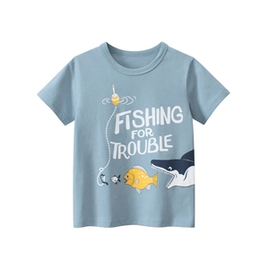 Close-up of light blue cotton T-shirt with shark print and Fishing for Trouble text