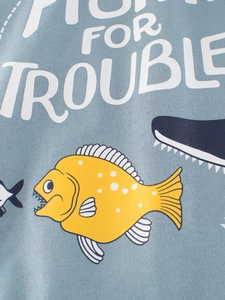 Kids short sleeve cotton T-shirt featuring piranha print and Fishing For Trouble text