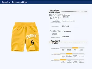 Detail view of yellow cotton kids shorts with FUNNY print and soft fabric texture