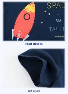 Detail of rocket print and neat sleeve stitching on navy blue cotton kids t-shirt