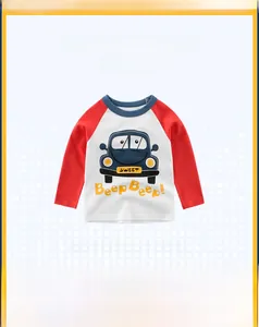 Detail of cotton raglan sleeve kids T-shirt with blue cartoon car and red sleeves