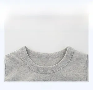 Close-up of the grey cotton ribbed neckline with durable stitching on kids' t-shirt