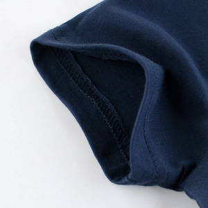 Close-up of navy blue cotton T-shirt sleeve with high-quality double-needle stitching