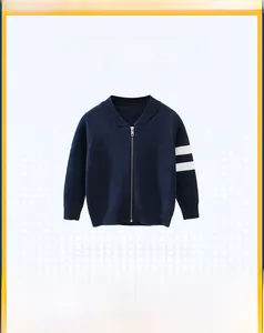 Close-up of navy blue knit cardigan for boys with white stripes on the sleeve