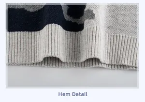 Detailed close-up of the ribbed hem on a kids camouflage knit sweater with tricolor patterns
