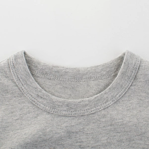 Close-up of light gray cotton long sleeve T-shirt with ribbed crew neck for boys