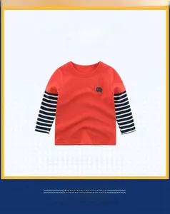 Detail of red cotton kids t-shirt featuring striped sleeves and an elephant embroidery patch