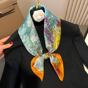 70cm silk-like neckerchief with retro floral print styled on a black sweater