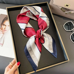 Elegant silk twilly scarf with red and white color blocking and classic letter M print