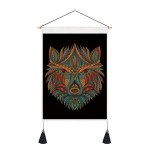 Close-up of wolf head dreamcatcher tapestry with vibrant tribal patterns and tassels