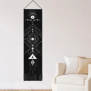 Bohemian black and white serpent wall tapestry with mystic symbols and fringe