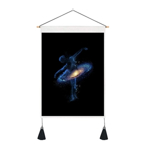 Artistic wall tapestry showing a starry nebula ballet dancer with wooden rod and tassels
