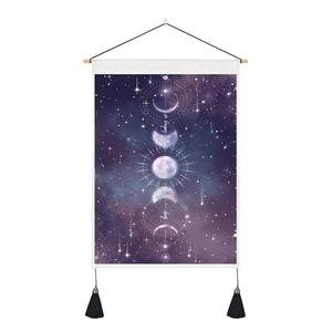 Detail of moon phases tapestry with purple starry sky and Keep looking up text