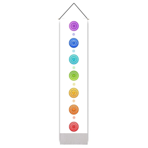 Vertical white canvas scroll with seven colorful chakra symbols and black hanging rope