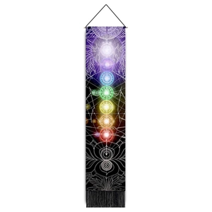 Detail of printed chakra meditation tapestry with colorful symbols and black tassels