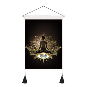 Detail of meditation wall scroll featuring a golden lotus and black silhouette with tassels