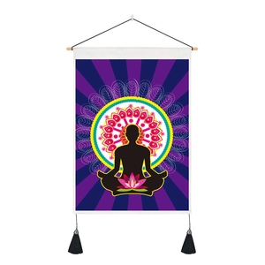 Detail of meditation tapestry featuring black silhouette and pink lotus flower with tassels