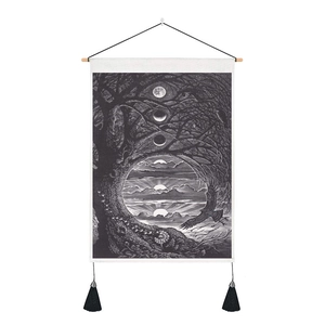 Detail of vintage tarot style tapestry with tree and moon phases on white background