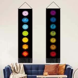 Vertical bohemian seven chakra tapestry with hanging wood rod and black tassels