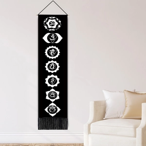 Bohemian style wall tapestry with seven white chakra symbols and black tassels for home decor