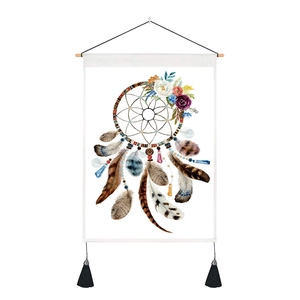 Detail of bohemian dreamcatcher tapestry with watercolor feathers and black tassels