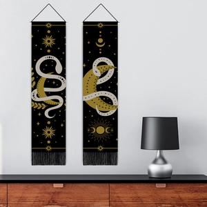 Set of two bohemian snake tapestries with gold sun and moon motifs and black tassels