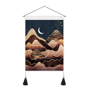 Detailed mountain sun tapestry showing cotton-linen texture and black tassels