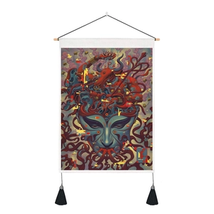 Detail of surreal elephant tapestry with wooden pole and black hanging tassels