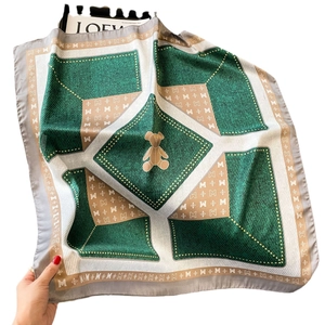 Silk square scarf with green geometric teddy bear prints and stylish M-letter motifs