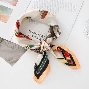 French retro chain print silk scarf with geometric colorful patterns on magazine