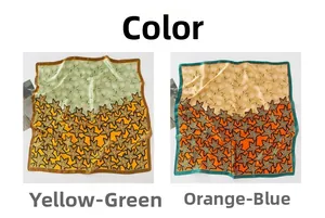 Detail view of vintage floral silk scarves in yellow-green and orange-red patterns