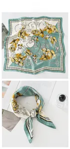 Détail de l'écharpe carrée en soie aux motifs de lys et bordures géométriques chic
